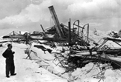 Frank Wild with the remains of the Endurance after the pack ice had crushed her.