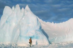 Man meets ice berg and turns to show profile
