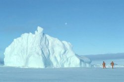 Antarctica sea ice skiers pass ice berg