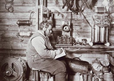 Walter Hannam at the wireless equipment