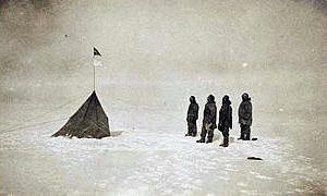 Roald Amundsen, Olav Olavson Bjaaland, Hilmer Hanssen, Sverre H. Hassel and Oscar Wisting by their South Pole marker tent and flag