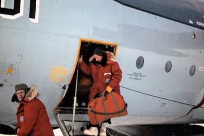 Carol on steps of plane