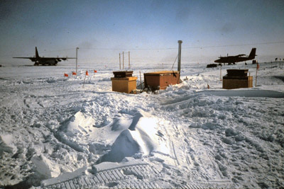 Hercules and twin otter on ground (ice)