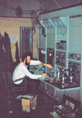 Joe Cornely, Chief Radioman USN at the radios