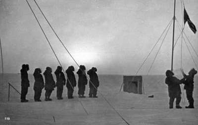 Raising the flag at Siple's pole marking sunrise 21 SEP 1961