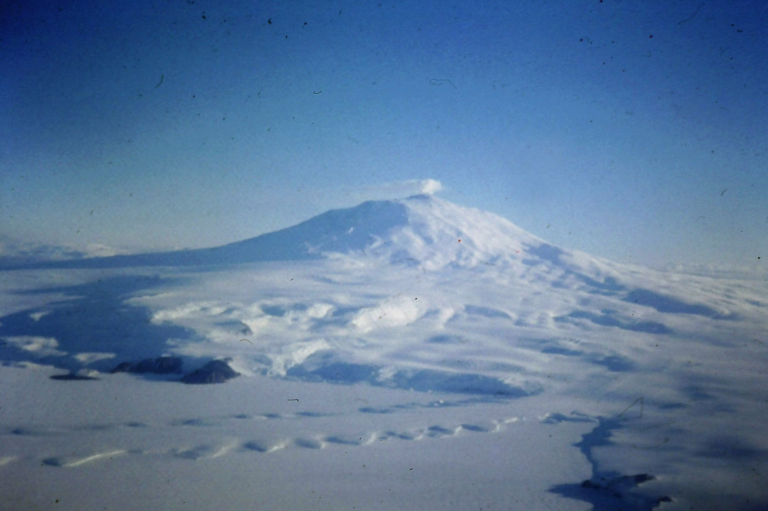 Mount Erebus seen from the air, with glacier in the foreground
