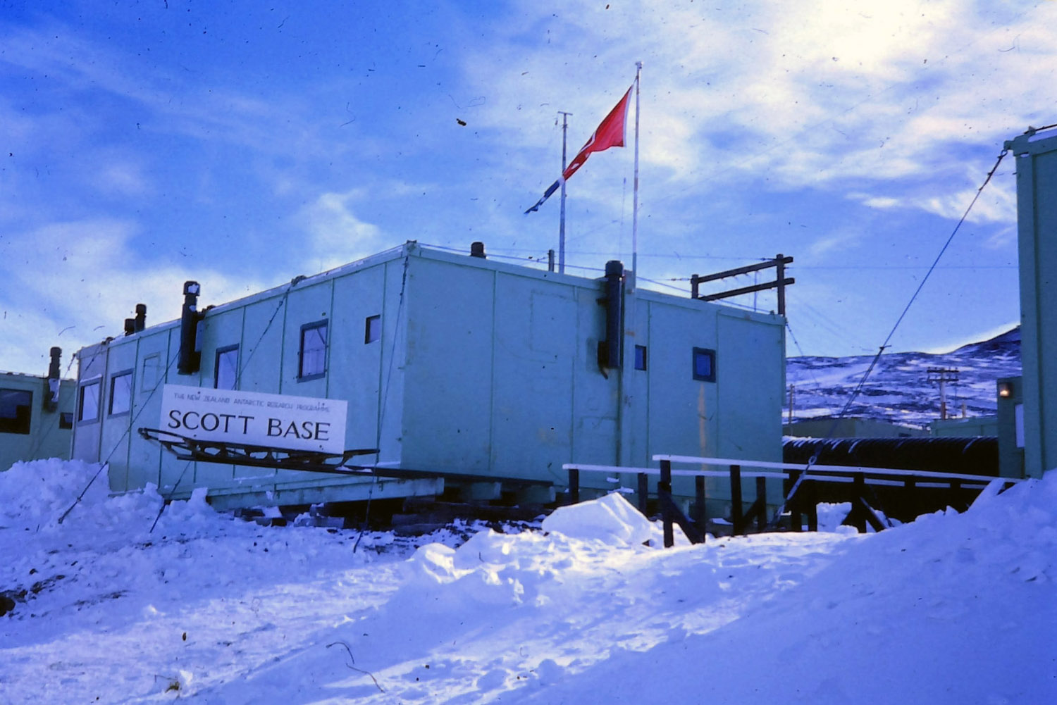 Main entry and post office at Scott Base - flying the flag of New Zealand Post