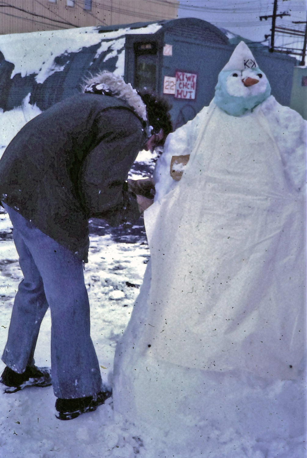 Making a snowman outside the New Zealand accommodation hut at McMurdo