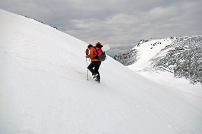 Climbing a snow slope