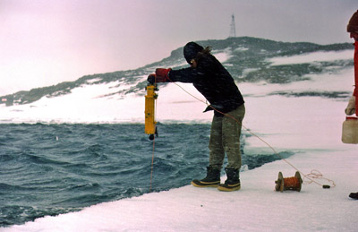 Water sampling at breaking edge of ice