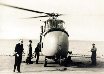 Cecil Boarding HMS Protector's Helicopter, March 1957