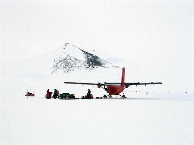 Twin otter and field party in Antarctica